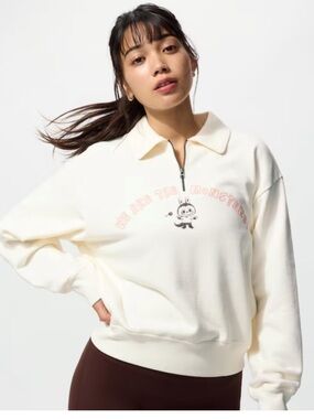 Uniqlo Cream Half-Zip Collared Sweatshirt with Pink Graphic